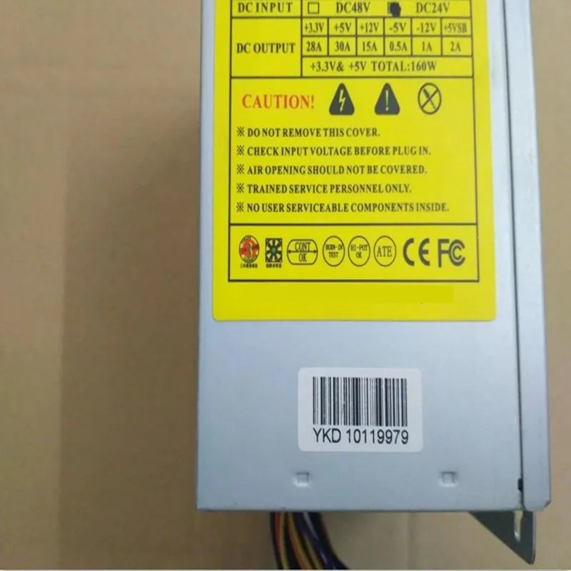 Silver ATX power supply unit with cooling fan and cable bundle