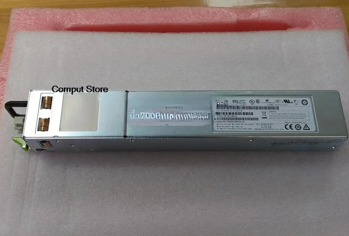 Silver metal rectangular ATX power supply unit with rear fan grille and power connector