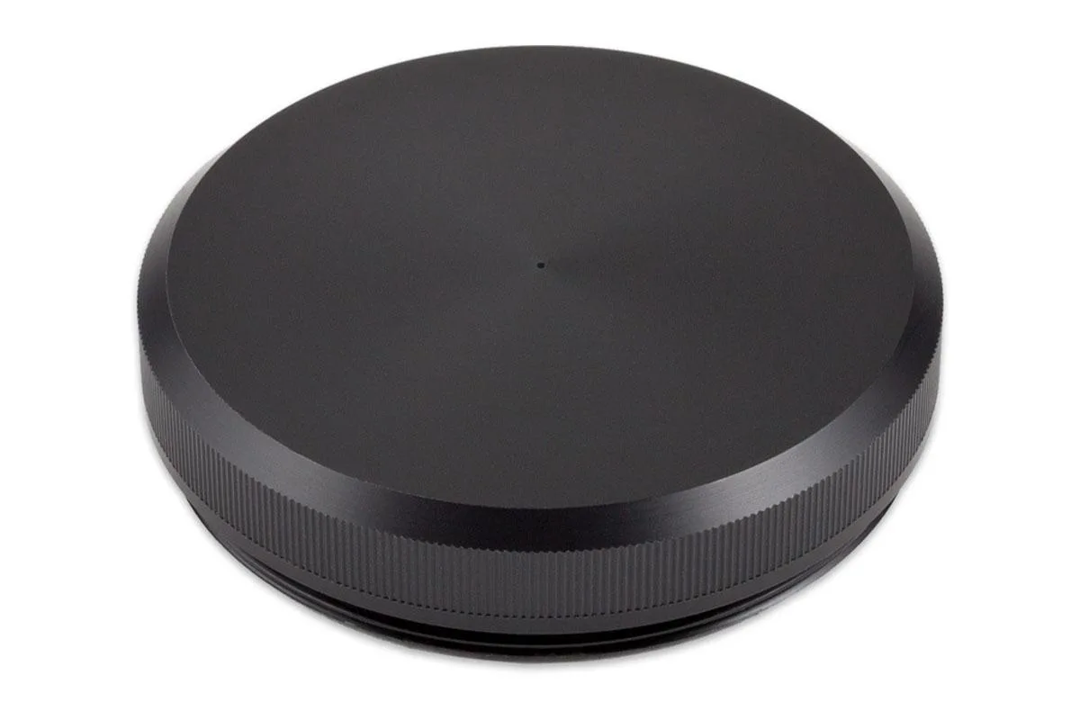 Black cylindrical reservoir top with integrated pressure membrane visible on the upper surface