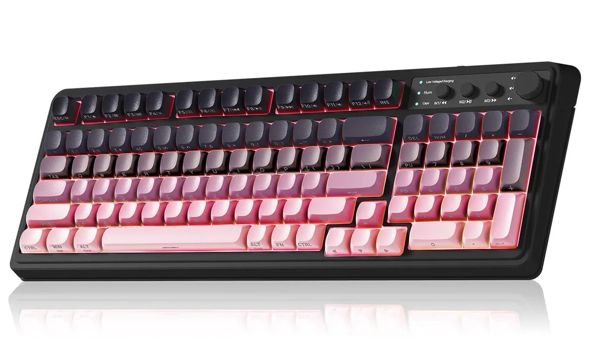 Full-size 99-key membrane keyboard in black and pink gradient with RGB backlighting