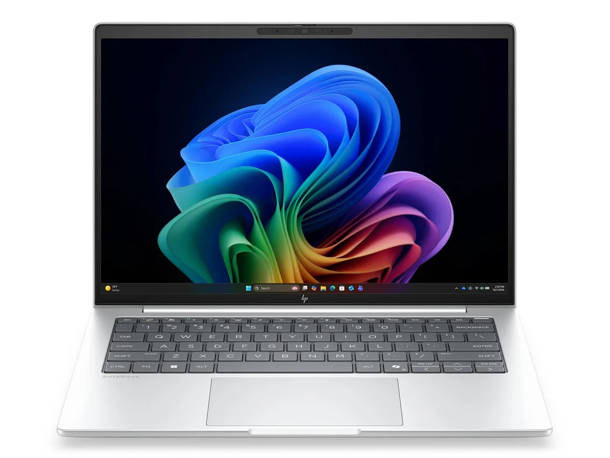 Silver 14 inch touchscreen laptop, thin tapered profile