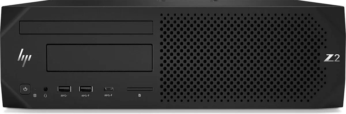 Black small-form-factor desktop tower with visible scratches on the case
