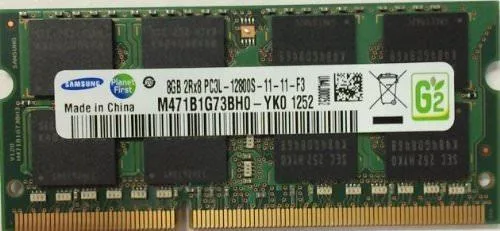 Green rectangular circuit board with black memory chips and gold edge connector