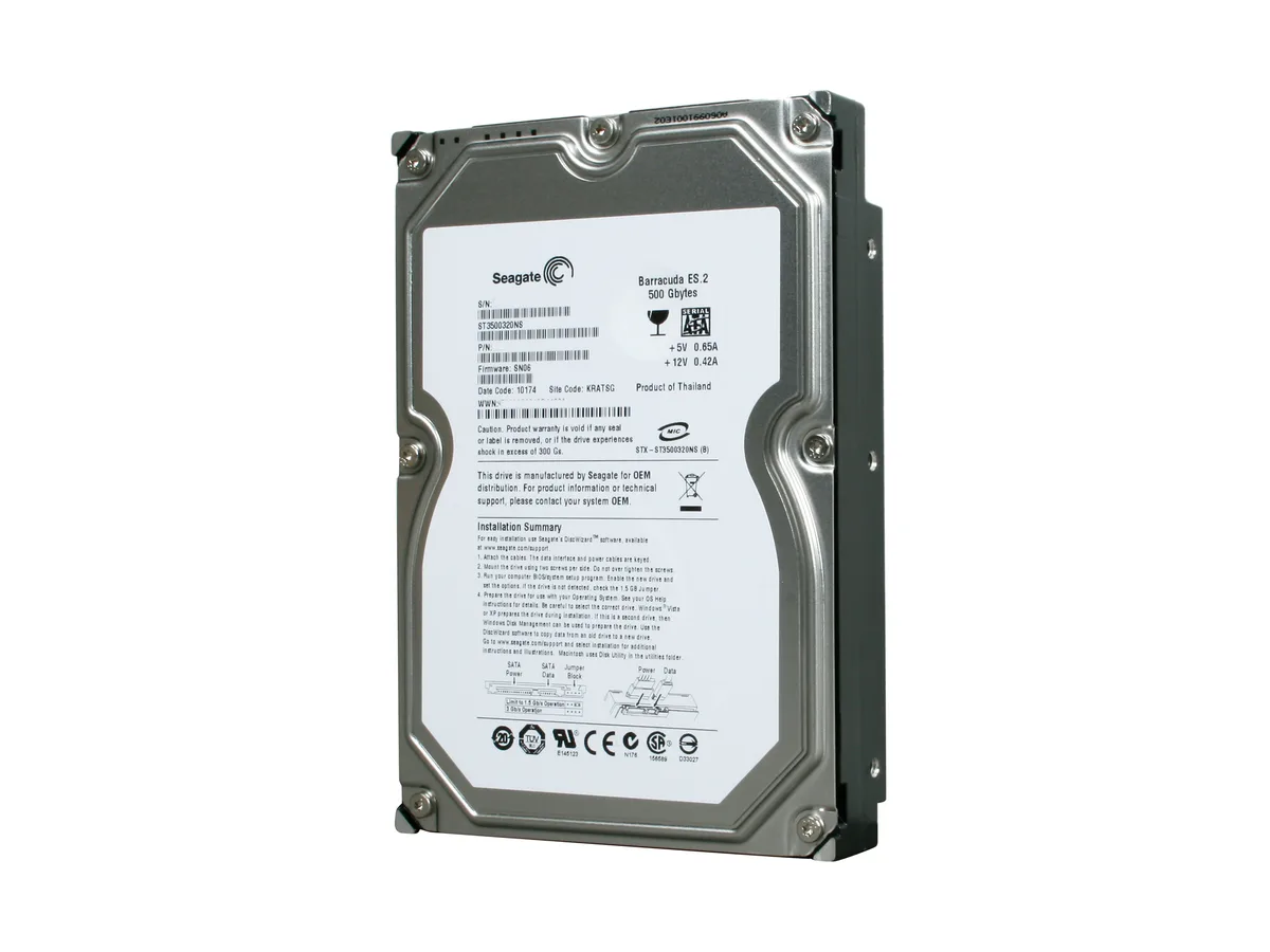 Silver 3.5 inch bare hard drive with exposed circuit board
