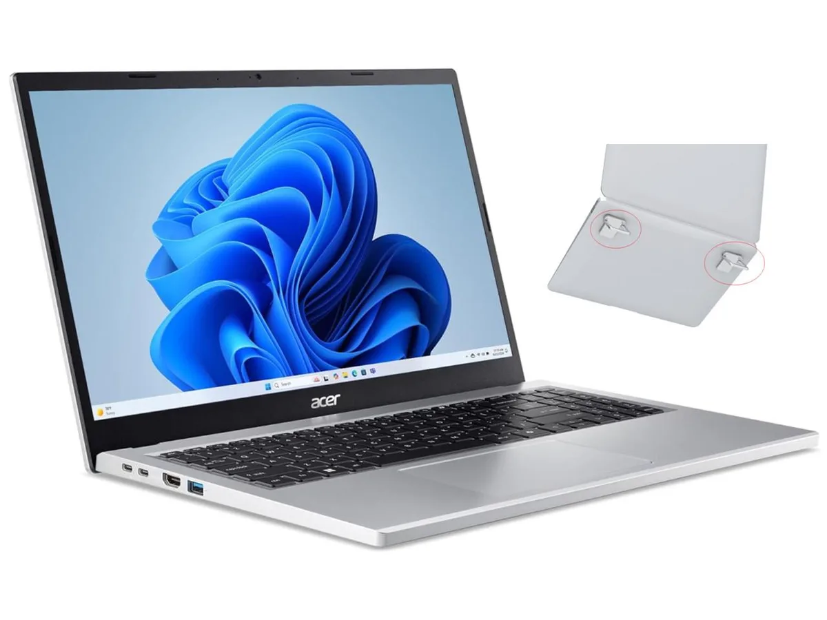 Silver 15.6 inch laptop closed on a stand, thin profile