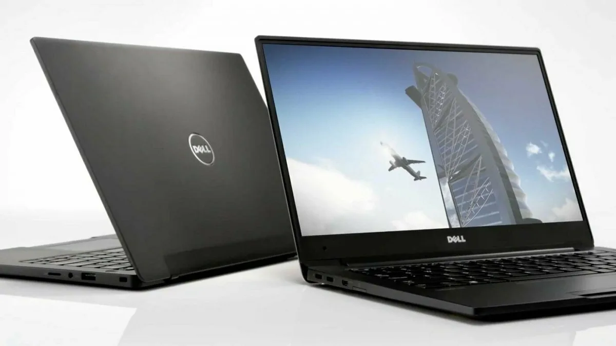 Silver 12.5 inch touchscreen laptop closed on flat surface