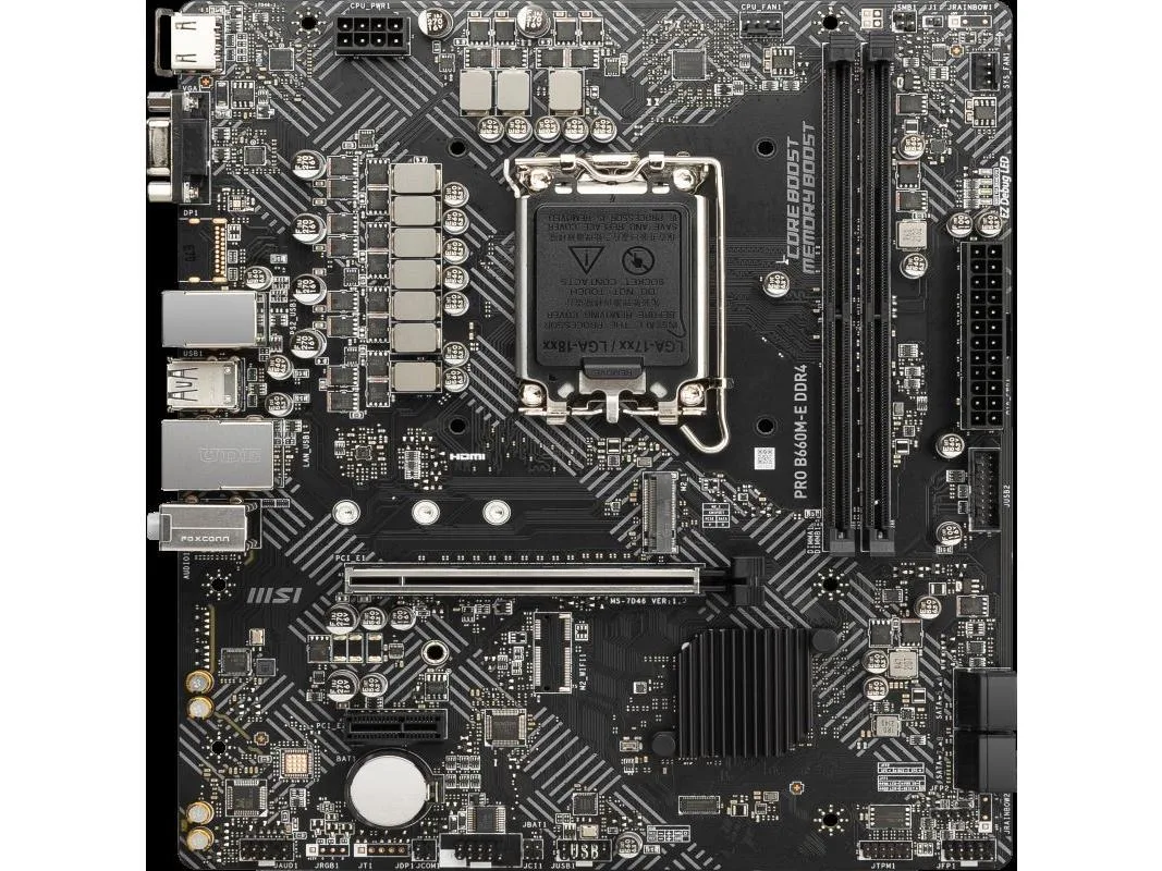 Green Micro ATX motherboard with silver heatsinks, black PCB, LGA 1700 socket, four DDR4 slots, PCIe x16 and x1 slots