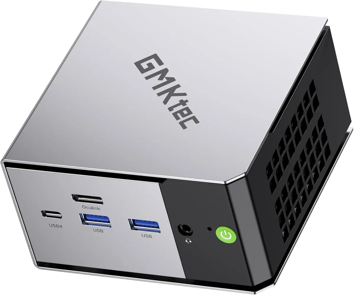 Silver cube mini PC with front USB and audio ports