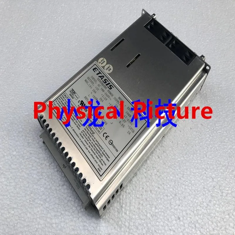 Rectangular ATX power supply unit, matte black metal casing with ventilation grille and rear fan visible