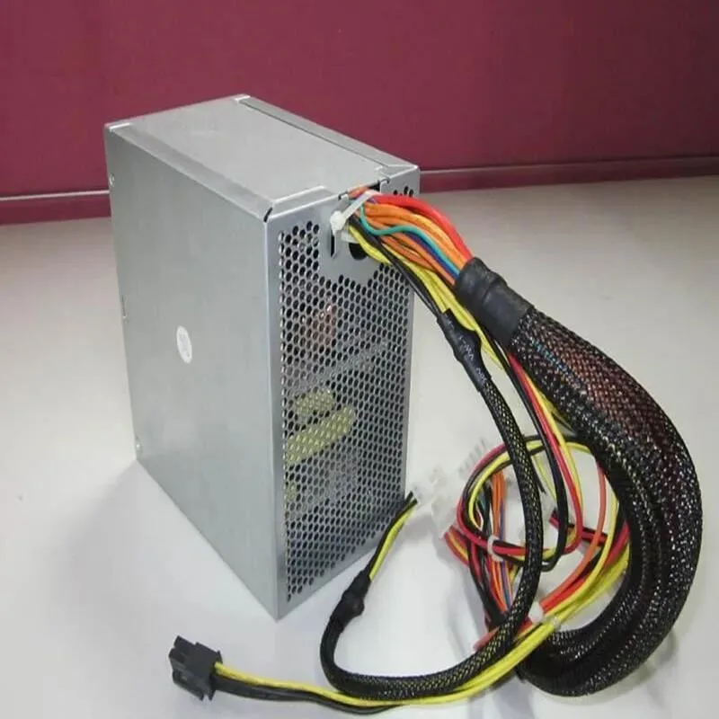 Standard ATX power supply unit in black metal casing with cooling fan and cable bundle