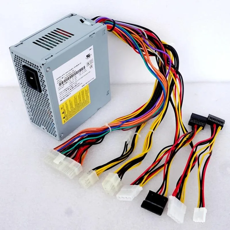 Compact SFX power supply unit in matte black metal casing with rear fan grille and power socket visible