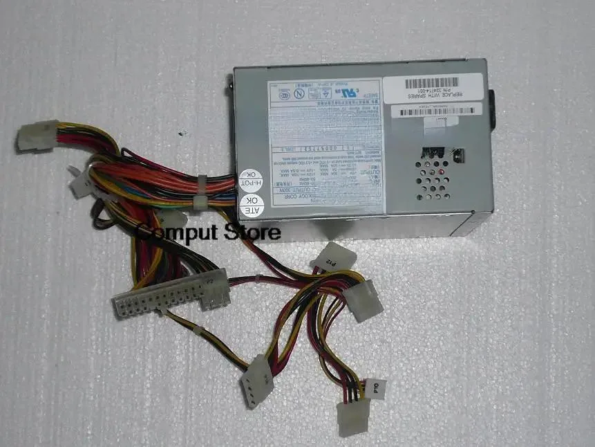 Rectangular silver server power supply unit with rear fan grille and power socket