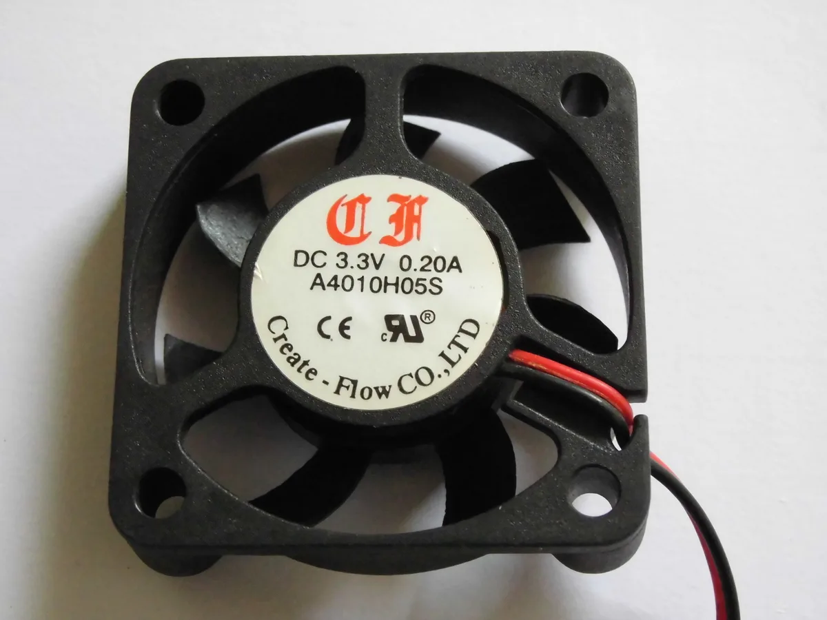 Small black square 40mm fan with two wires and a two-pin connector