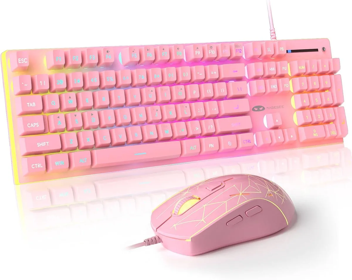 Pink full-size keyboard with matte metal panel and matching RGB mouse