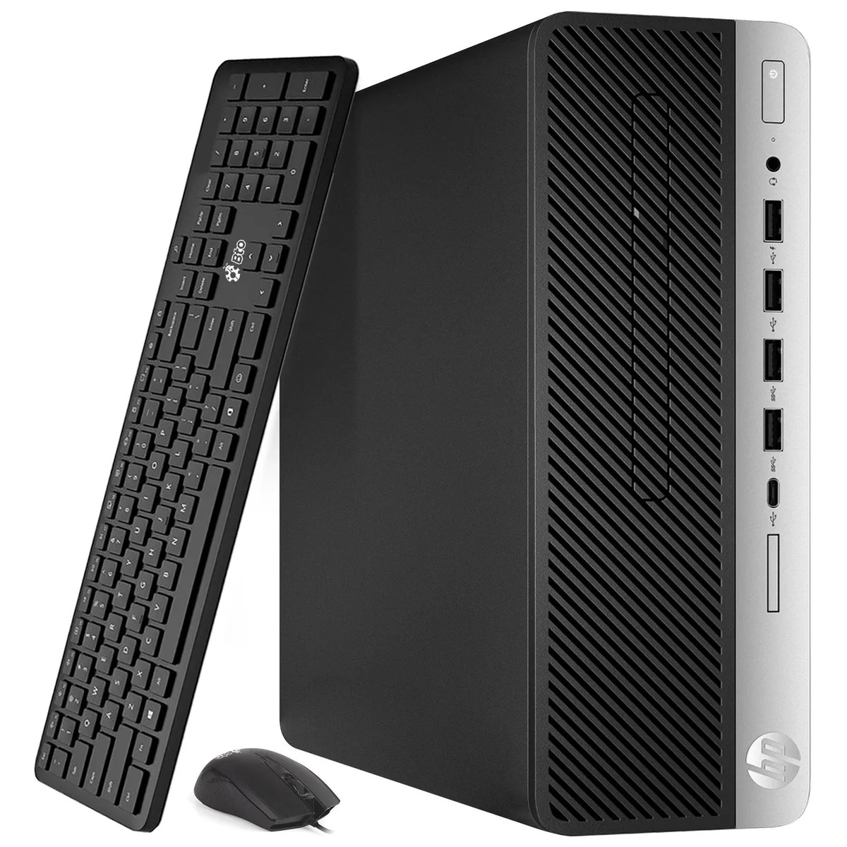 Black small-form-factor desktop tower with wired keyboard and mouse