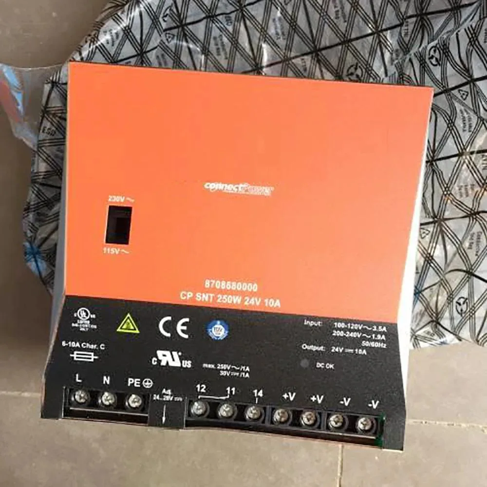 Rectangular metal power supply unit with ventilation grilles and terminal connections