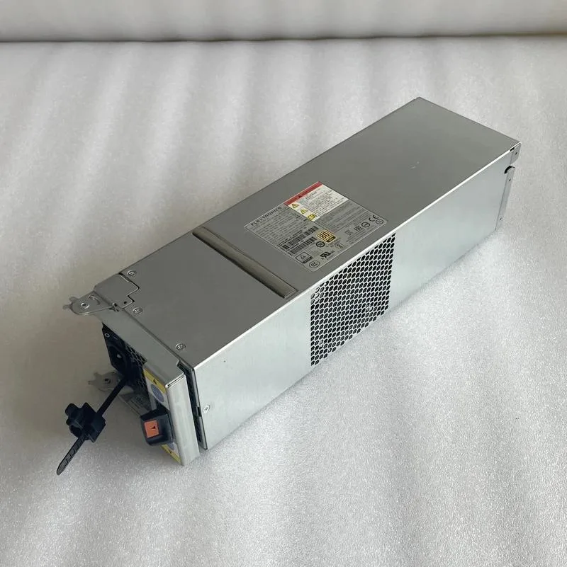 Silver rectangular ATX power supply unit with fan grille visible