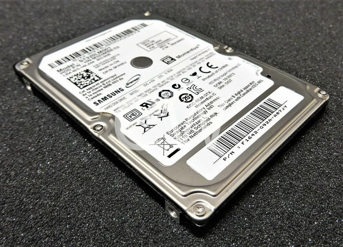 Silver 2.5 inch SATA hard drive with circuit board visible