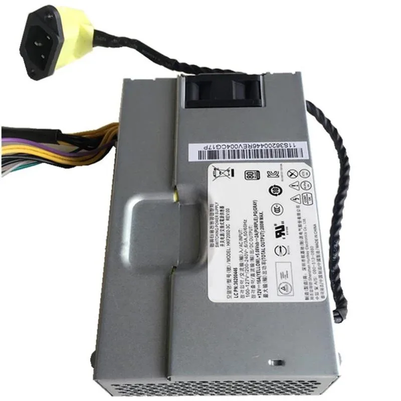 Rectangular metal ATX power supply unit with ventilation grille and cable bundle