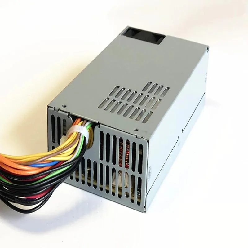 Rectangular silver ATX power supply unit with fan grille and cable bundle
