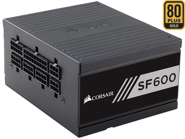 Compact silver SFX power supply unit with modular cable ports and single fan grille