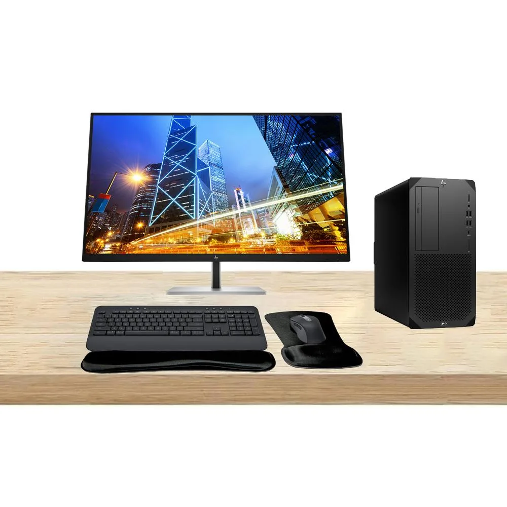 Black HP Z2 G9 tower workstation with dual 32-inch 4K monitors, wireless keyboard and mouse set, and WiFi adapter