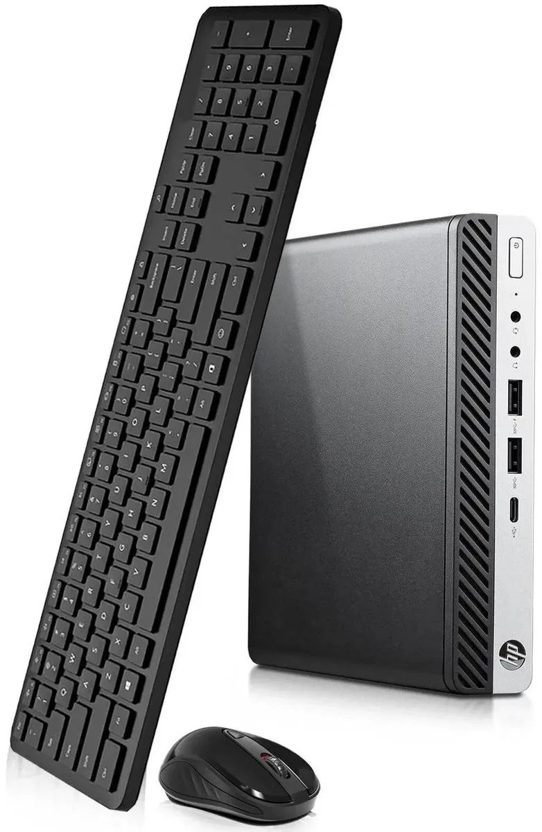Small black desktop tower, wired keyboard and mouse included