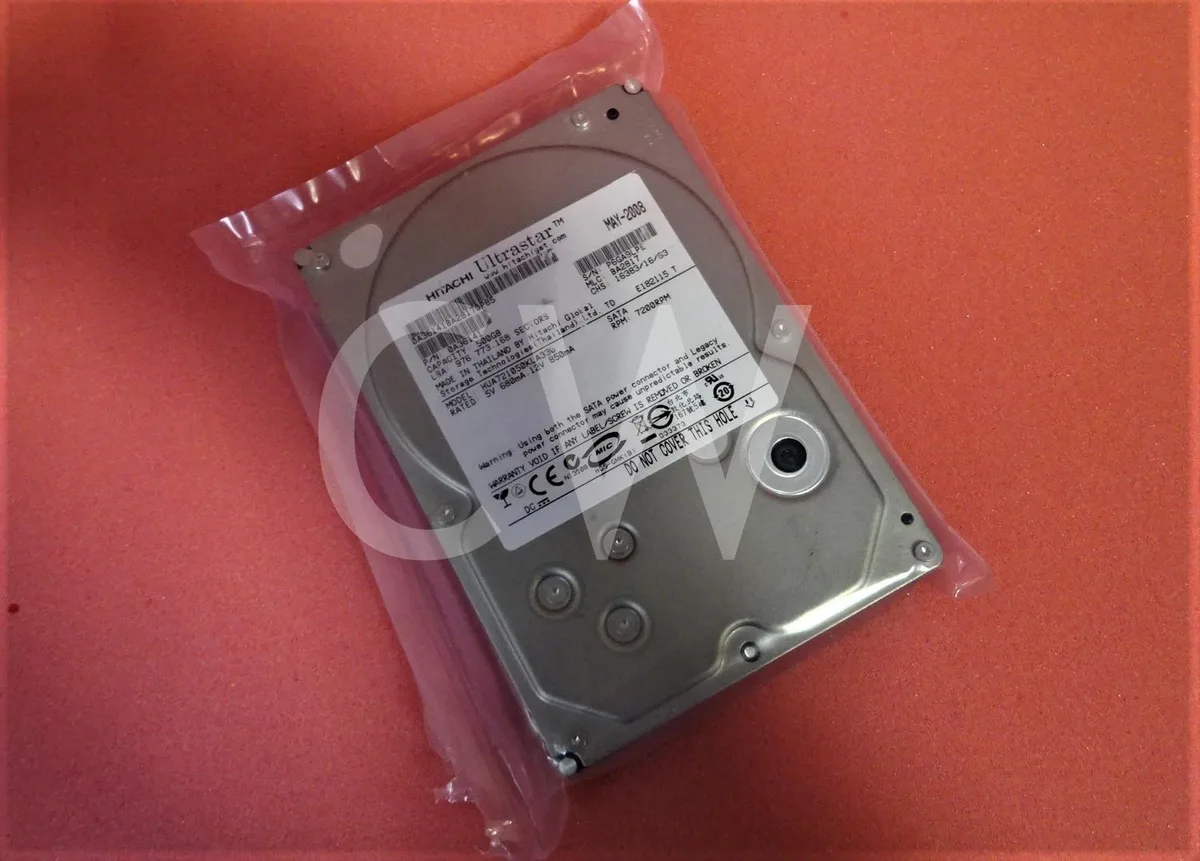 Silver 3.5 inch SATA hard drive with circuit board visible