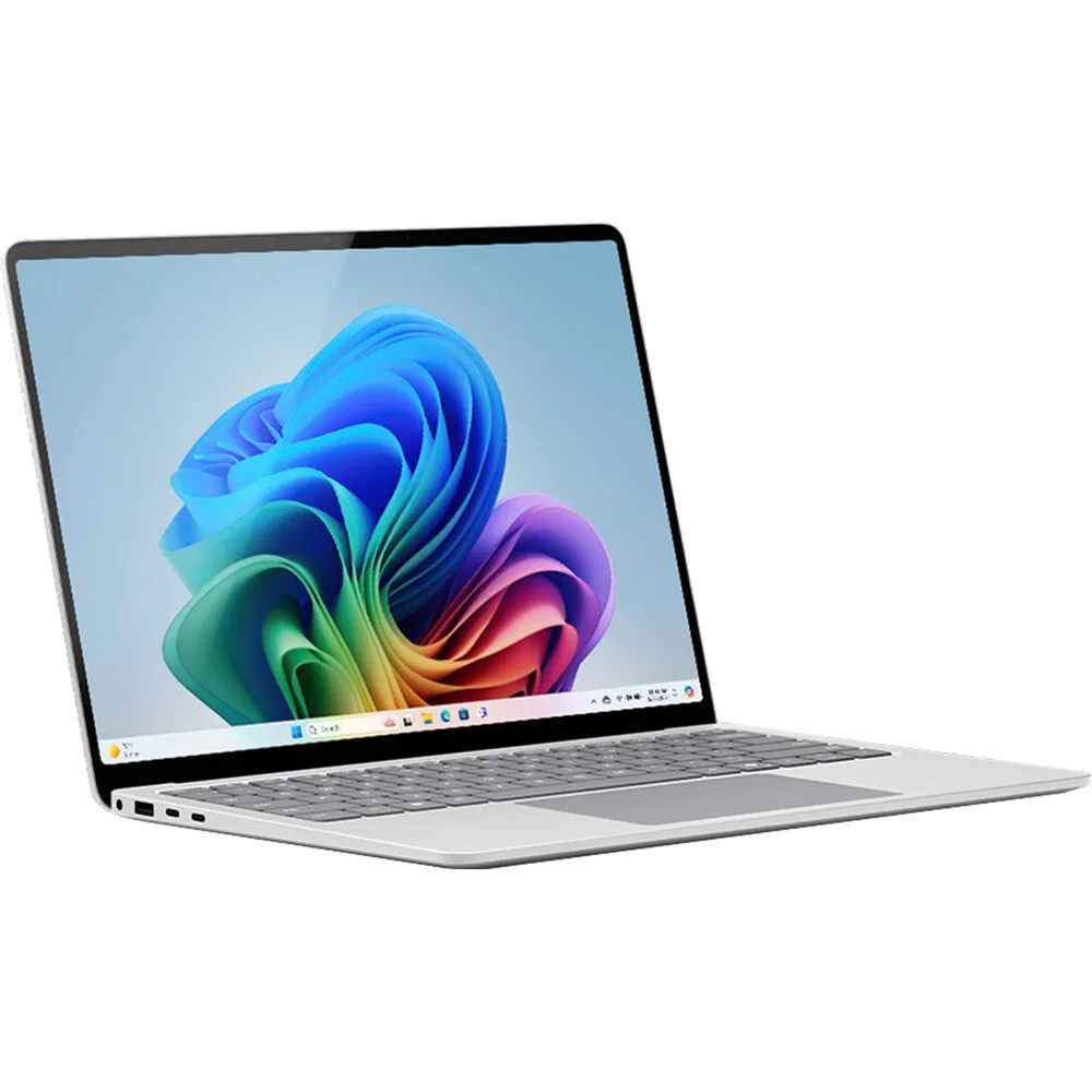 Thin platinum laptop with 13.8 inch touchscreen, closed lid showing clean lines