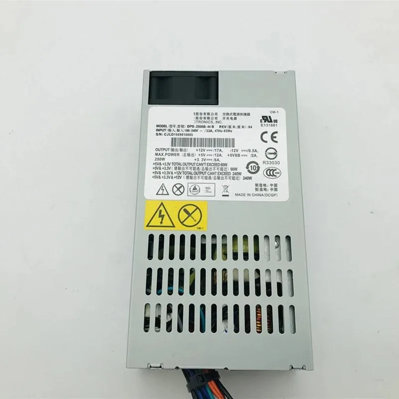 Rectangular silver ATX power supply unit with rear fan grille and side label