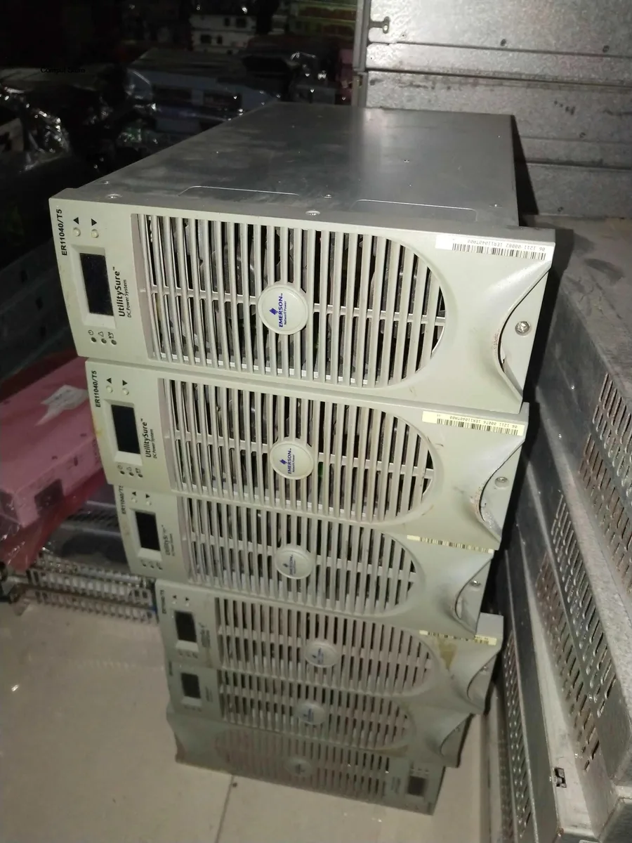 Silver ATX power supply unit with cooling fan and cable bundle