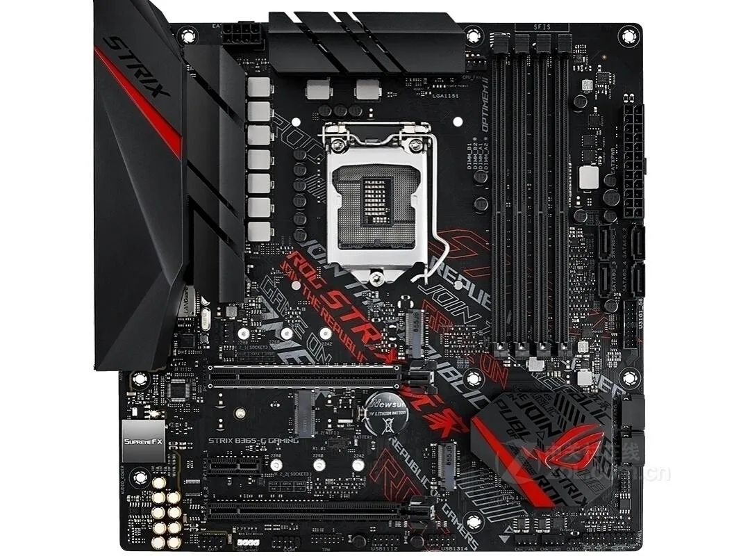 Black Micro ATX motherboard with grey heatsinks and red accents