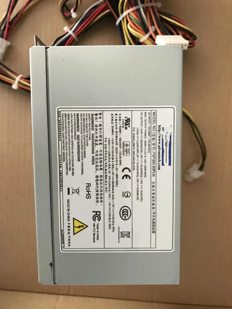 Black rectangular ATX power supply unit with cooling fan and cable bundle
