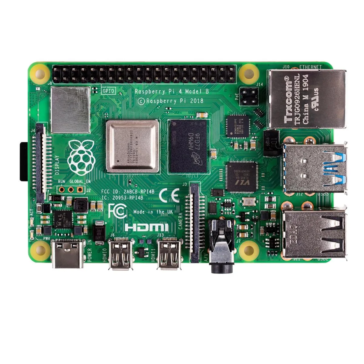 Green circuit board with silver ports and black chips