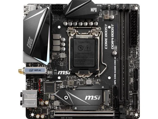 Compact Mini ITX motherboard with black PCB and silver heatsinks