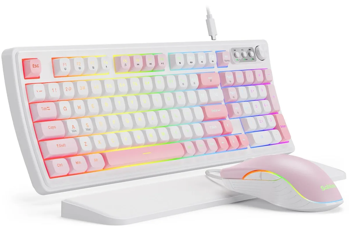 Pink and white 98-key membrane keyboard with RGB lighting, matching mouse and detachable wrist rest