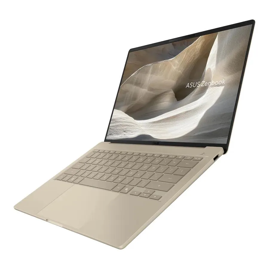 A thin 14 inch laptop in Zabriskie Beige, closed lid showing smooth matte finish
