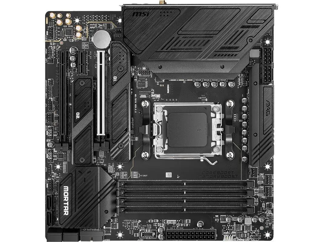 Dark green micro-ATX board with silver heatsinks and black rear I/O shield