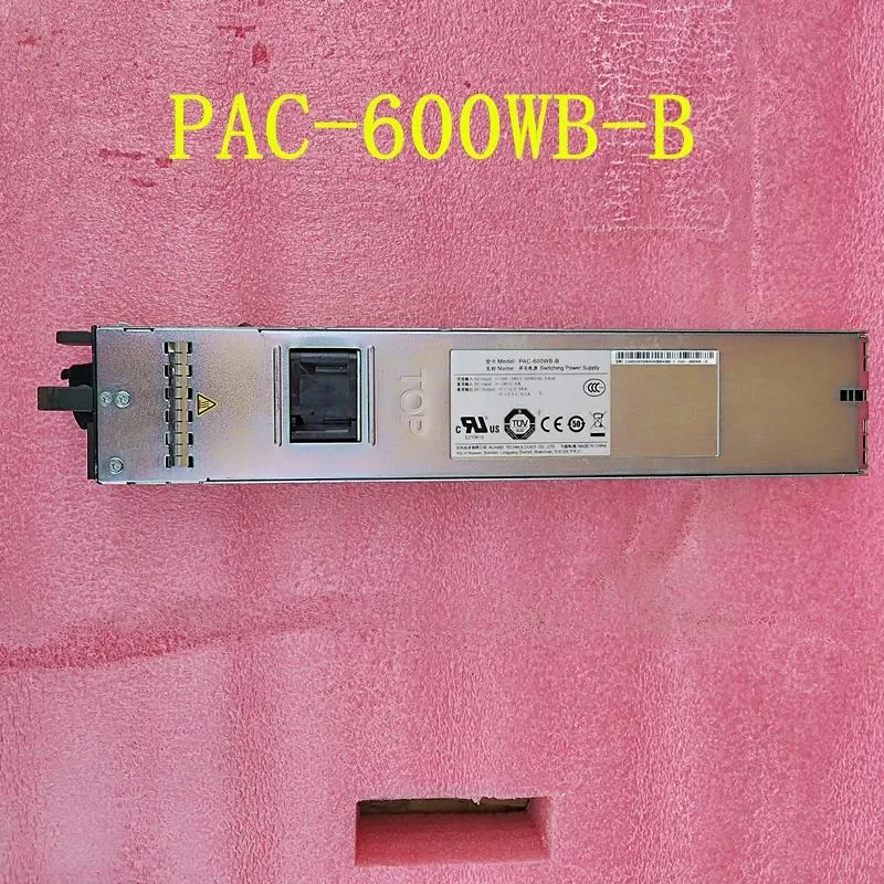 Black ATX power supply unit, rectangular metal casing, rear fan grille, side label visible