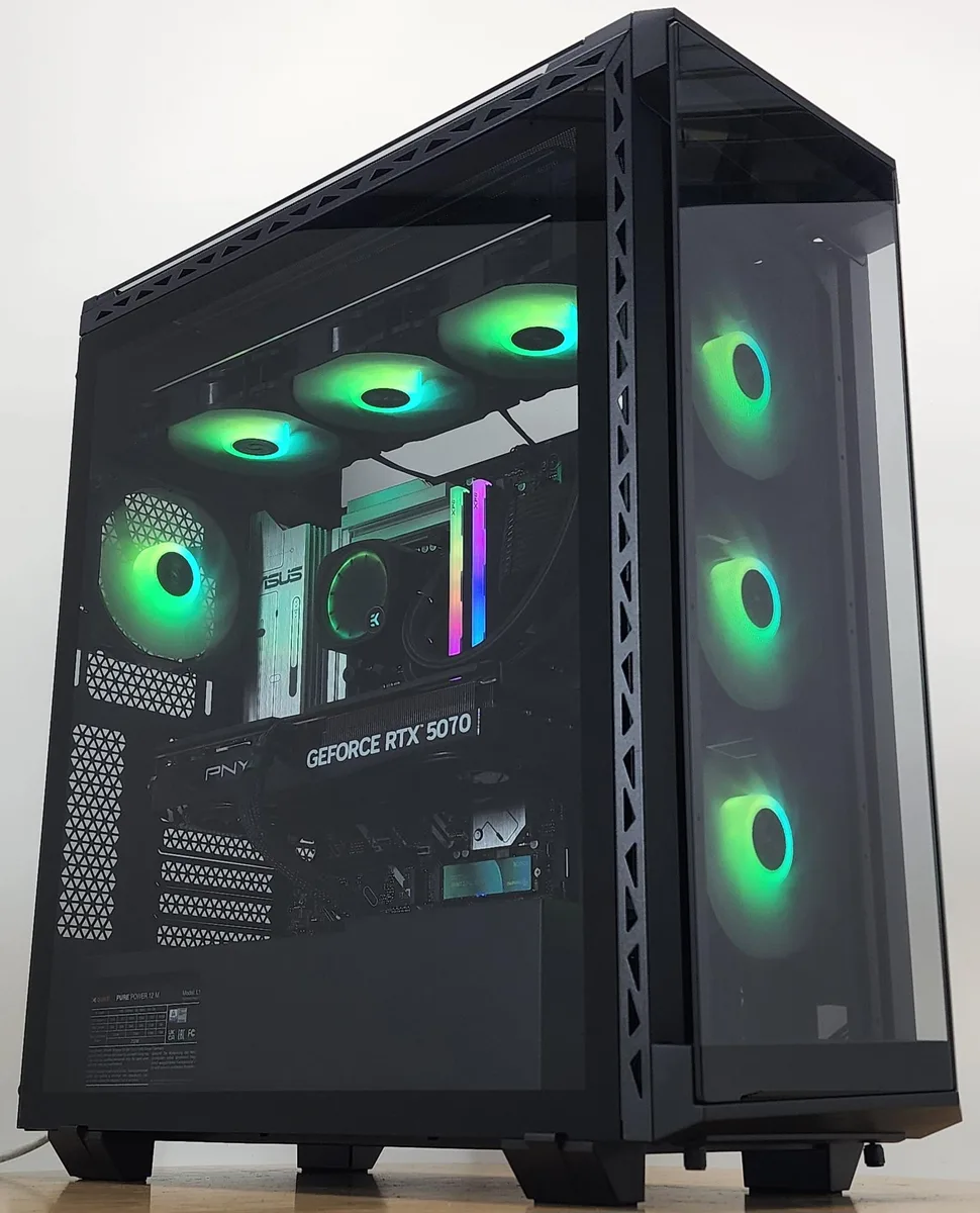White mid-tower gaming desktop with RGB liquid cooler visible through glass side panel