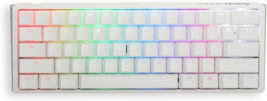 Pure white compact mechanical keyboard with RGB backlighting and textured keycaps