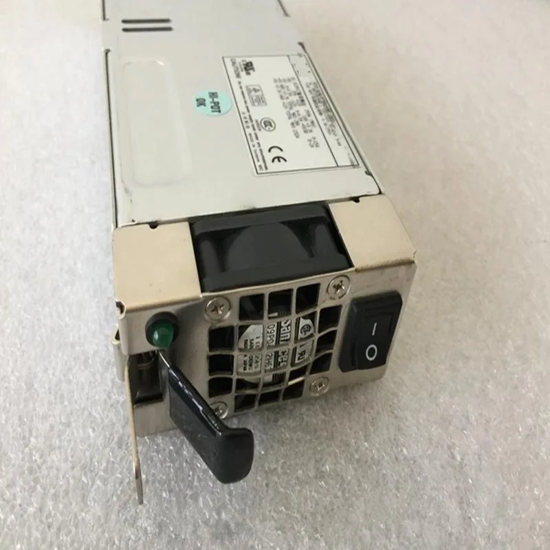 Compact black ATX power supply unit with rear fan grille