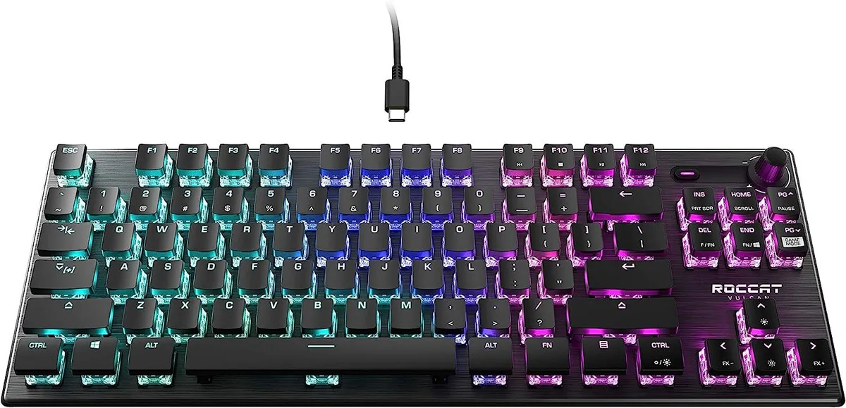 Compact black tenkeyless keyboard with anodized aluminium top plate and RGB lighting