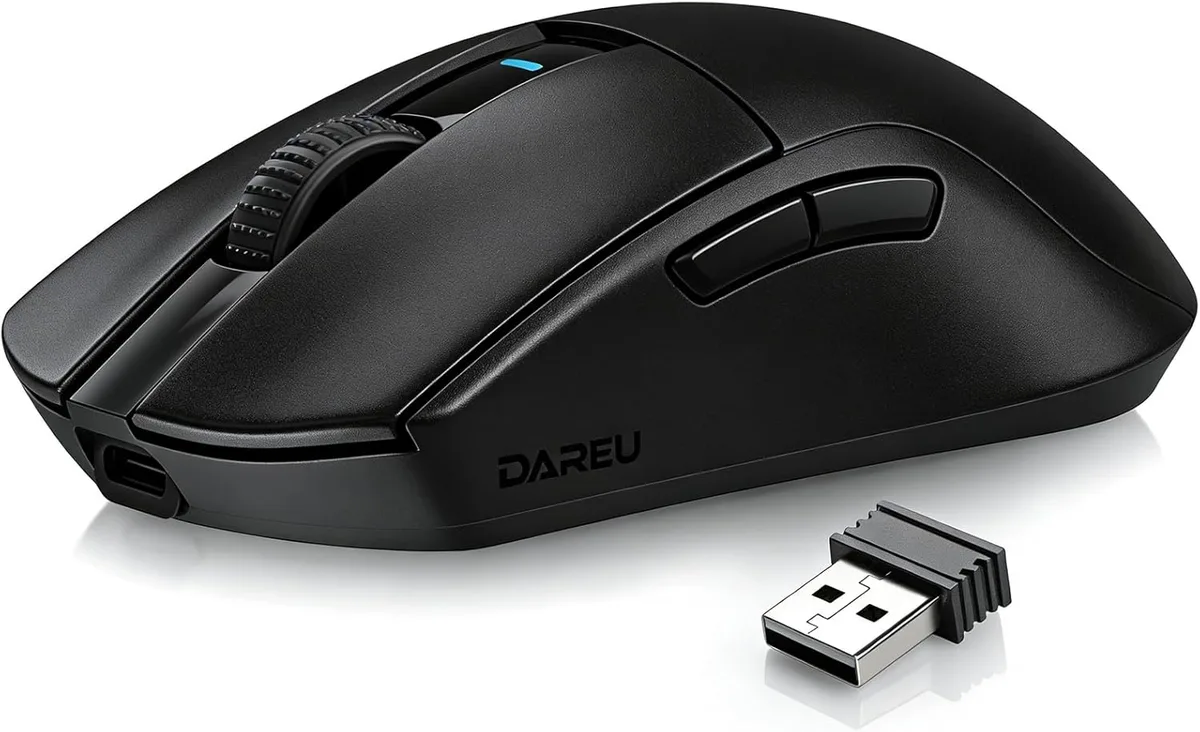 Black lightweight gaming mouse with symmetrical shape and textured buttons