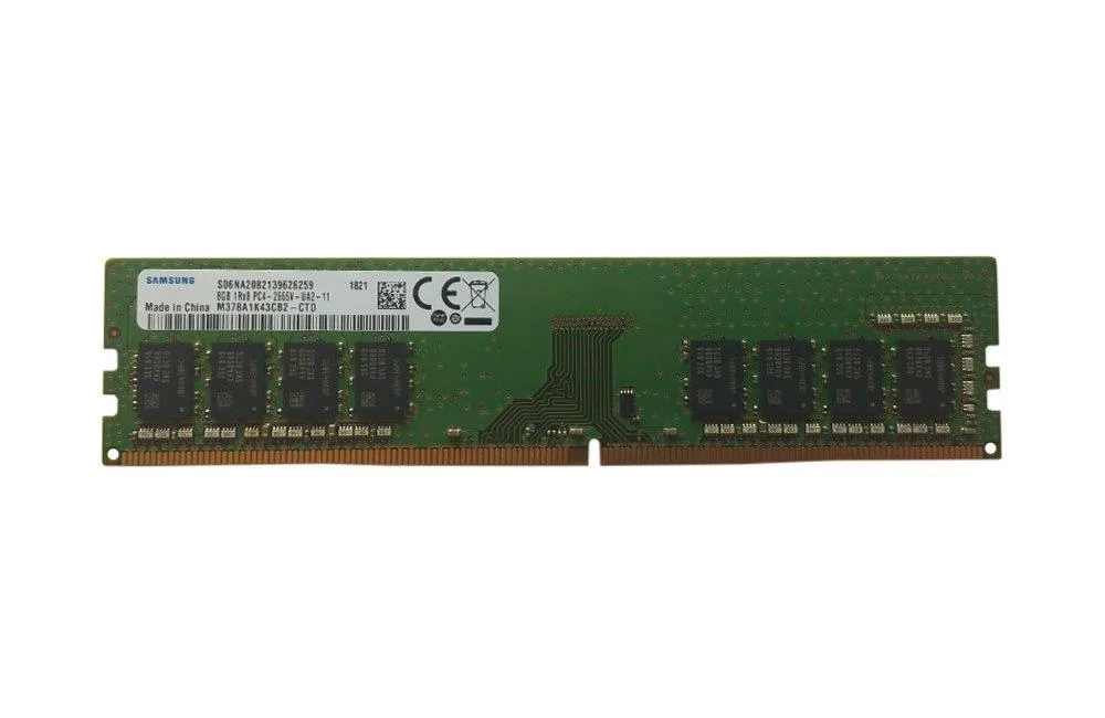 Green rectangular circuit board with black memory chips and gold edge connectors