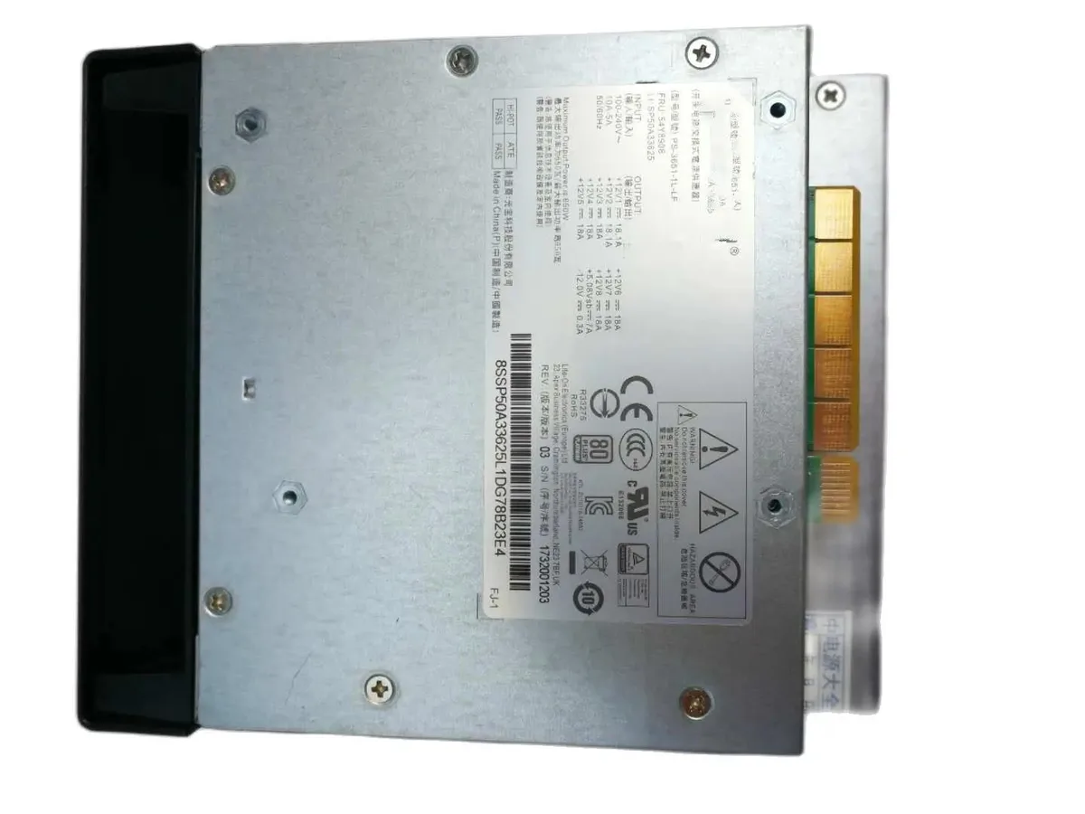 Rectangular silver ATX power supply unit with ventilation grille and label showing model numbers