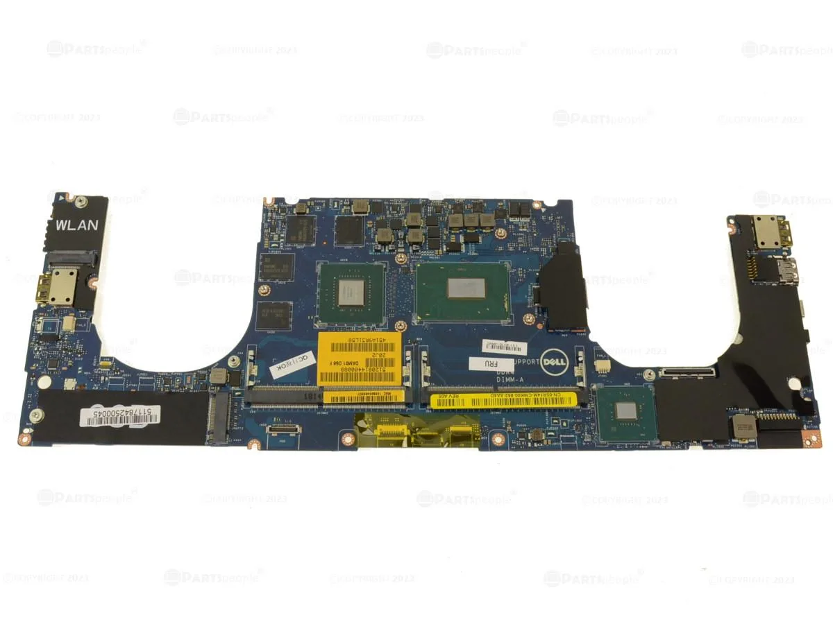 Green circuit board with silver heatsink and black GPU chip