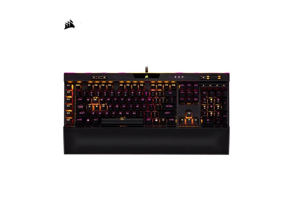 Black aluminium gaming keyboard with per-key RGB lighting, detachable wrist rest and dedicated media controls