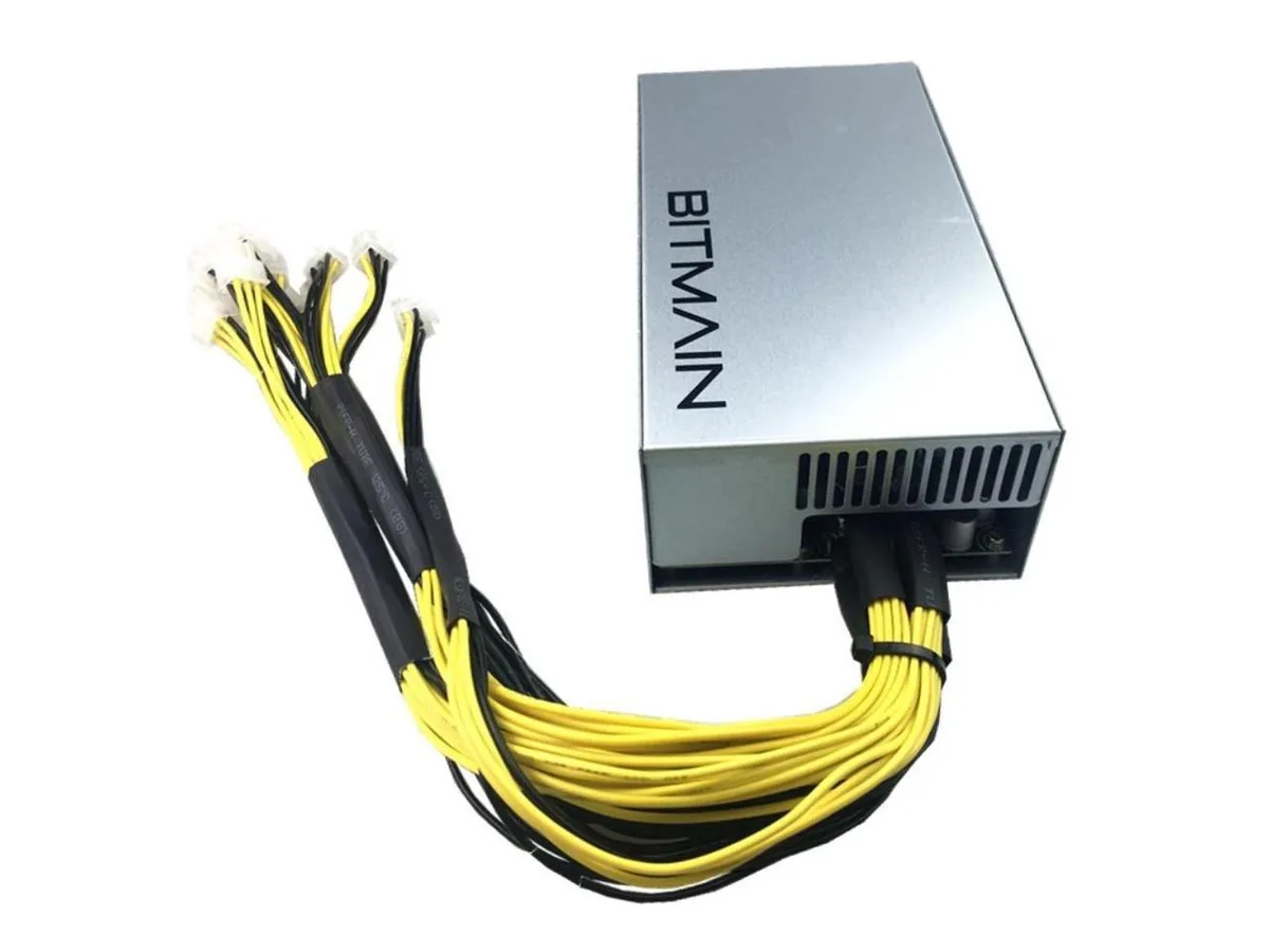 Rectangular silver ATX power supply with ten PCI-E connectors on one side