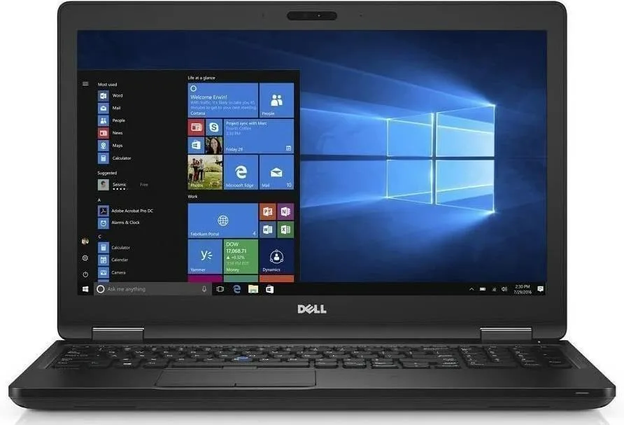 Silver Dell Latitude 5580 15.6 inch laptop closed on flat surface
